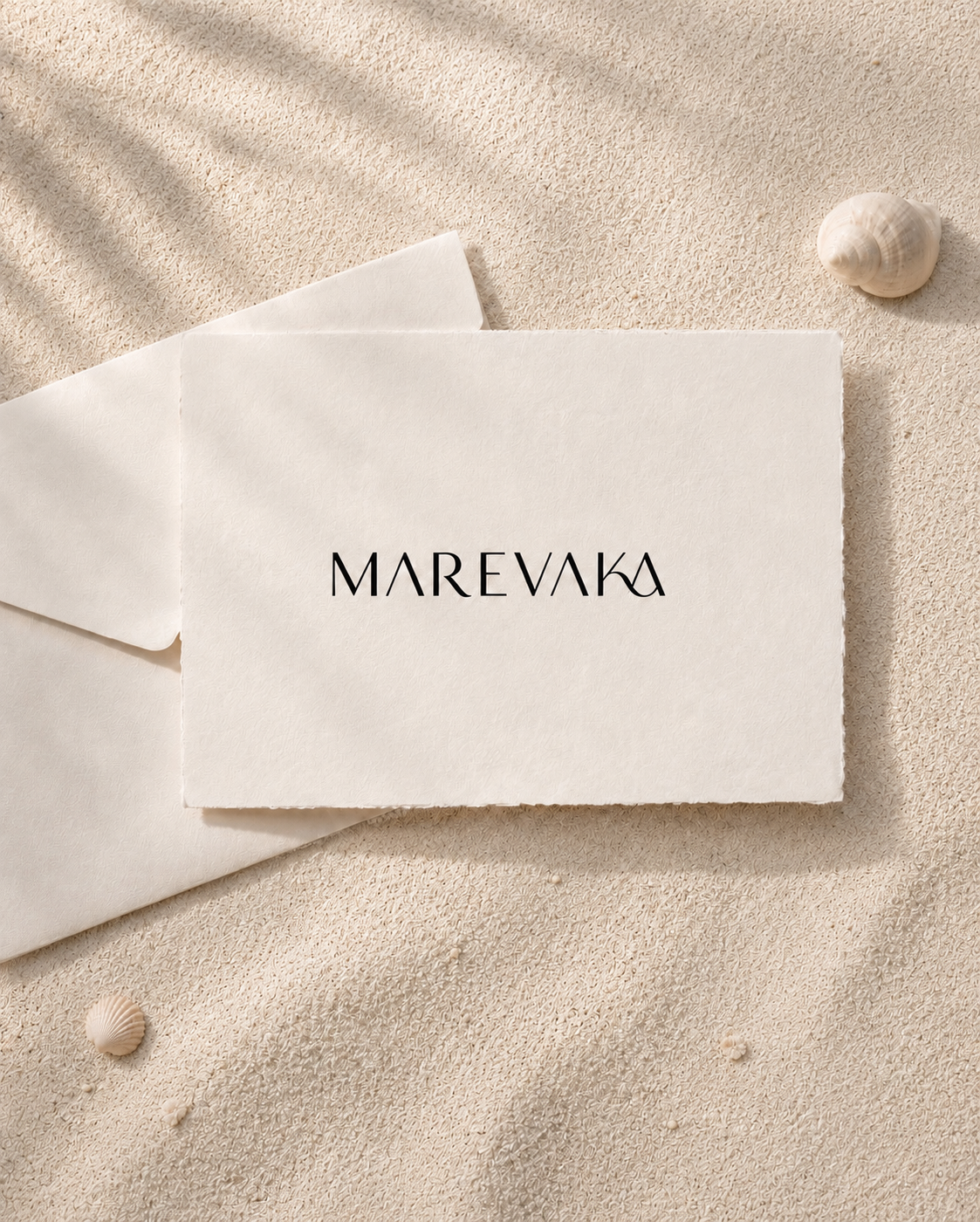 Marevaka gift card on ivory paper, sand and raffia